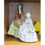 A Royal Doulton figurine 'Rhoda' HN1573, 26.5cm high and another 'Gentlewoman' HN1632, 19cm high, (