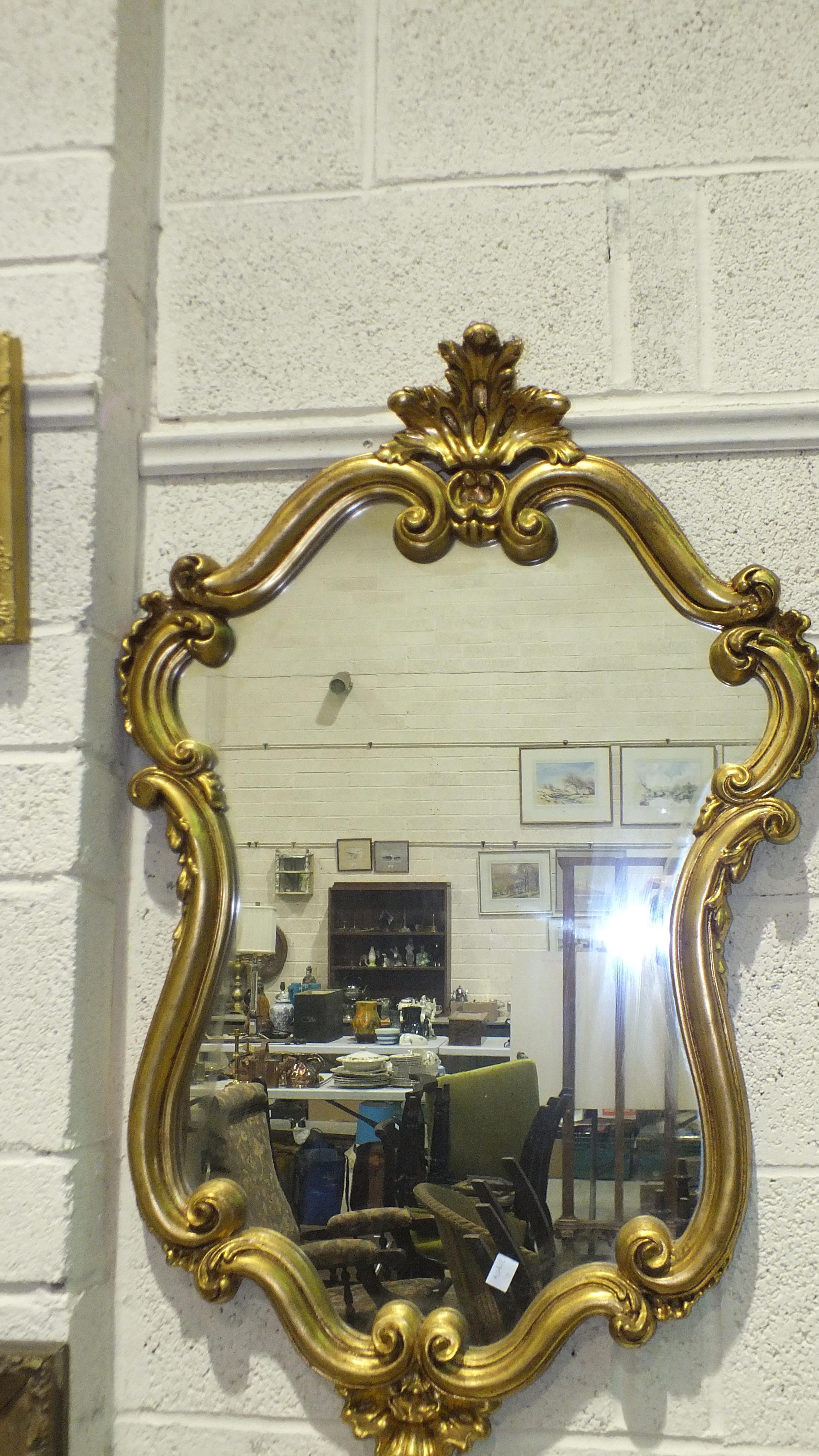 A modern gilt scrolling frame wall mirror, 98 x 63cm, a wool-work picture and an oleograph - Image 4 of 4