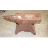 An iron anvil, 56cm long, 29cm high.