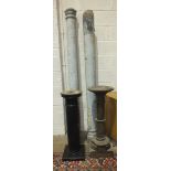 A pair of painted wood pillars, 204cm and 194cm high and two wood pedestals, 90cm and 95cm high.