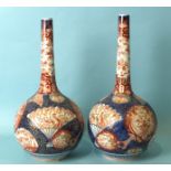 A pair of late-19th century Arita bottle vases, 32cm high, (2).