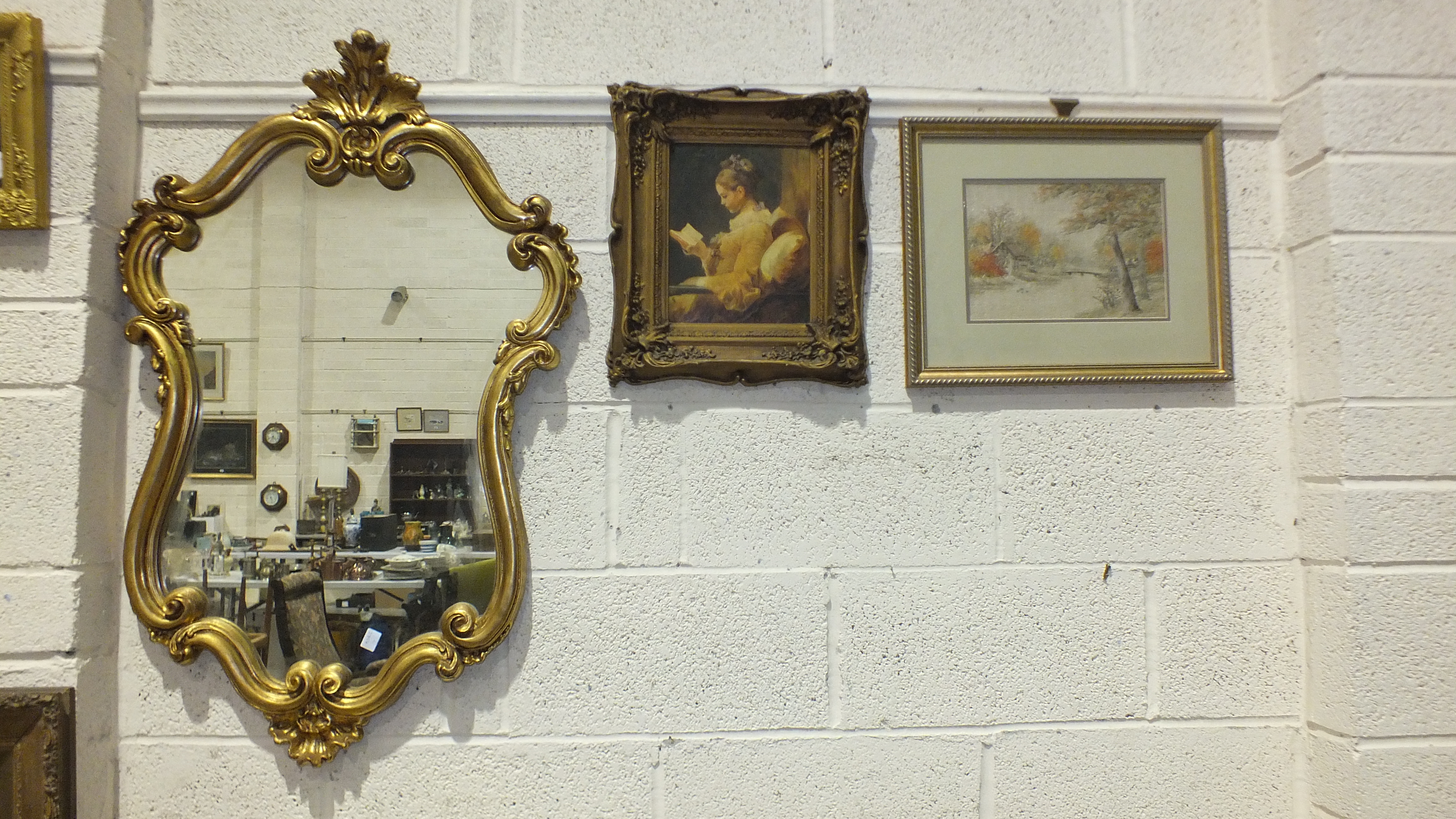 A modern gilt scrolling frame wall mirror, 98 x 63cm, a wool-work picture and an oleograph - Image 3 of 4