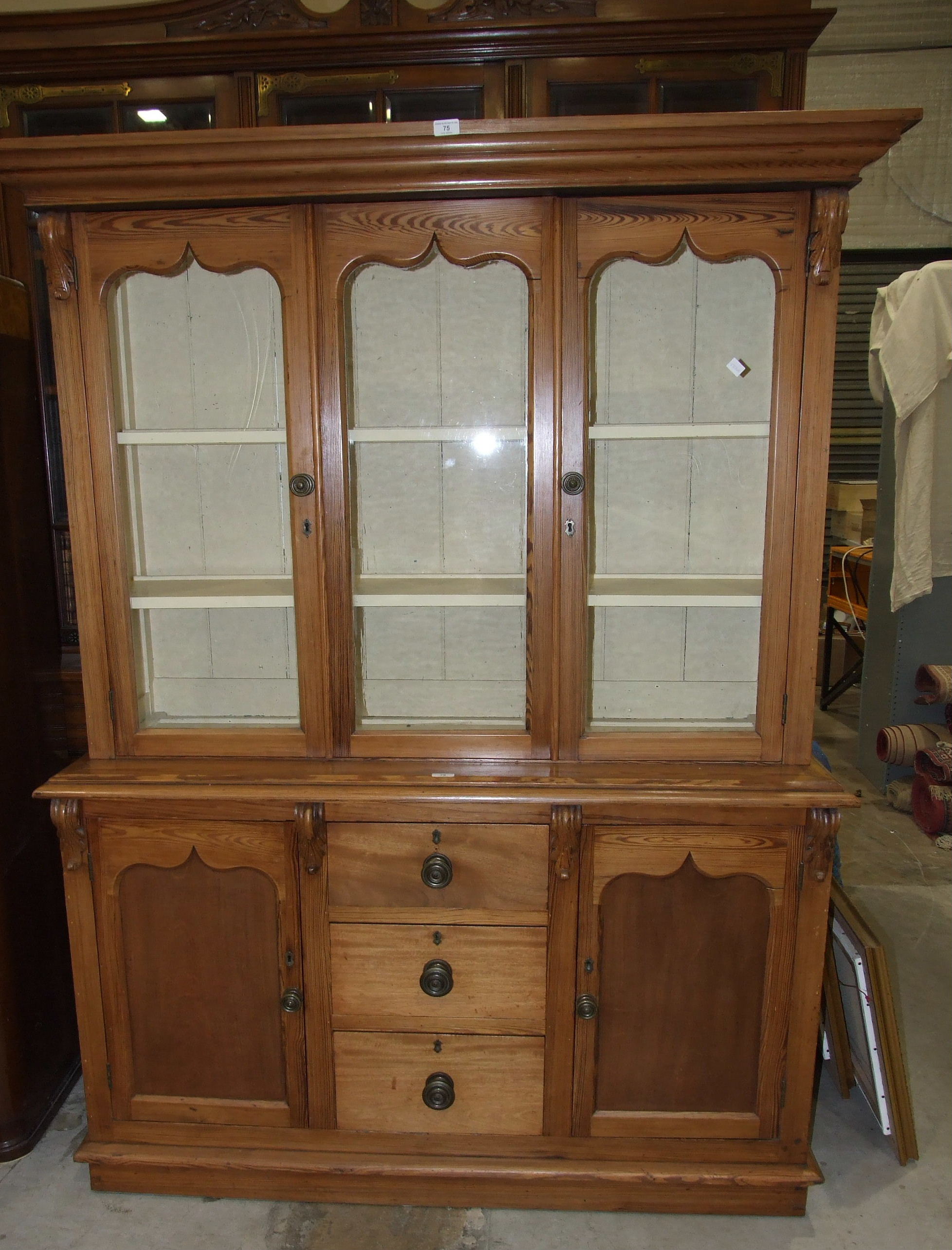A Victorian pitch pine dresser, the moulded cornice above three glazed doors, the lower part with - Image 2 of 3
