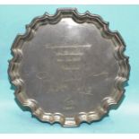 A small silver tray with engraved inscription, 15cm diameter, ___4½oz (approximately).