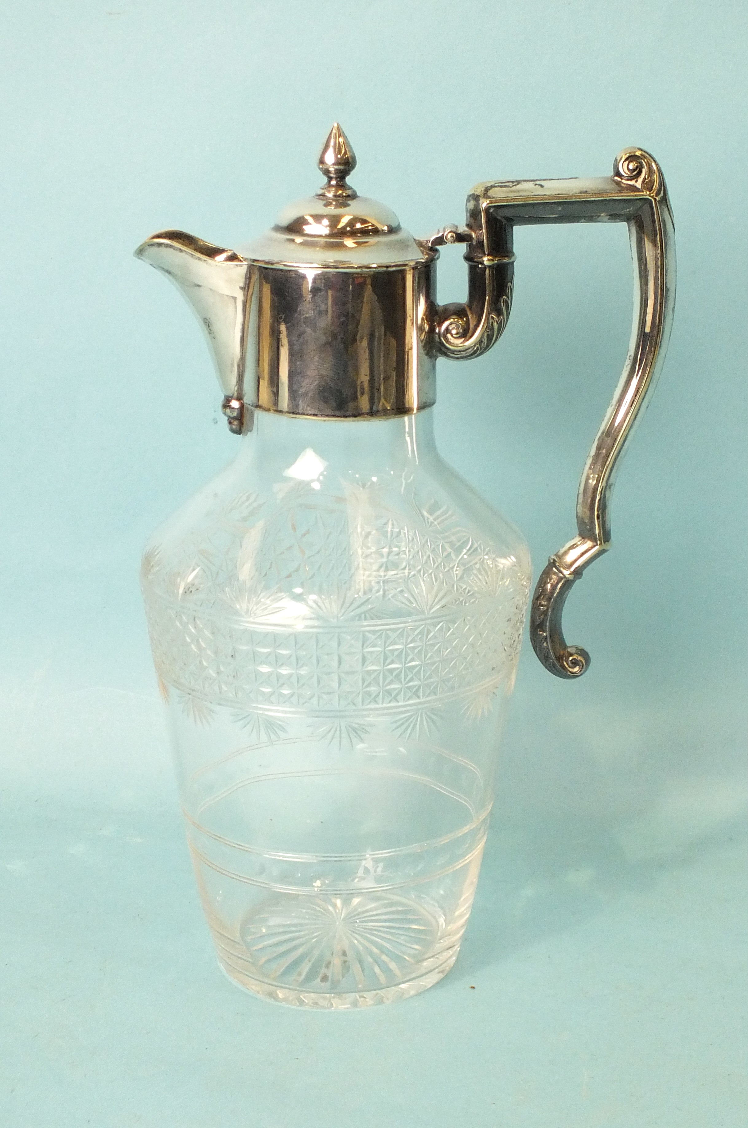 A Victorian cut-glass claret jug with plated mounts, handle and hinged lid, 26cm high.