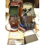 An Avo Model 8 Universal Avometer in leather case, a Record 'Minor' insulation tester, a pair of