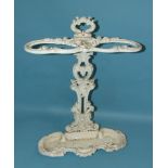A painted cast iron two-division stick stand of scrolling foliate design, 64cm high.
