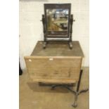 An oak and cast-iron adjustable bed table labelled Harrods Ltd, London SW, an oak dressing glass,