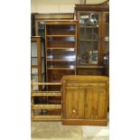 A modern yew wood narrow open bookcase with adjustable shelves, 183cm high, 61cm wide,