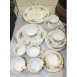 Twenty-two pieces of Royal Albert Moss Rose tea ware, (one cup and saucer seconds).