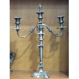 A plated three-branch candelabrum, 53cm high.