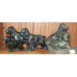 A Royal Doulton black gloss model of a spaniel, HN20, another smaller, HN21, a similar Goebel model,