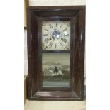 An American striking wall clock by Chauncey Jerome, New Haven, Conn, the glazed door with a panel