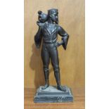A continental bronzed metal male figure of a water carrier, a jar on his shoulder, on marble base,