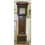 An oak cased 30-hour long case clock with bell-striking chain driven movement, 196cm high.