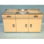A 1950's English Rose painted metal kitchen unit with sink top above two drawers and three