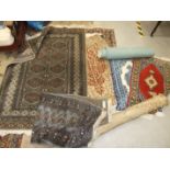 A collection of eight Pakistan and other modern small rugs, (8).