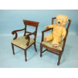 A miniature mahogany carver chair in the early-19th century style, with upholstered seat, on