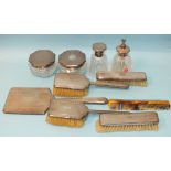 A nine-piece silver dressing table set of stepped octagonal design, with engine-turned engraving,