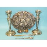 A pair of loaded silver candlesticks, the circular bases engraved NCH Puppy Show 1936, 18.25cm high,