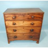 A Georgian mahogany chest of four long drawers, on bracket feet, 93cm wide, 94cm high.