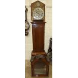 An early-19th century mahogany long-case clock, the arched brass 33cm dial with silvered chapter