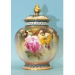 A Royal Worcester pot pourri vase and cover decorated with roses, green factory mark, date mark
