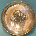 A small shallow dish embossed with the profile of a bloodhound, maker S & Co, Birmingham 1910,