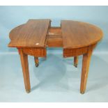 An early-20th century military mahogany extending 'D'-end dining table on plain square tapered