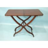 A 19th century mahogany hunting table, the rectangular folding top with flush hinges, on