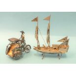 An Indonesian miniature novelty white metal cycle-rickshaw marked YOGYA, 6cm long and a white