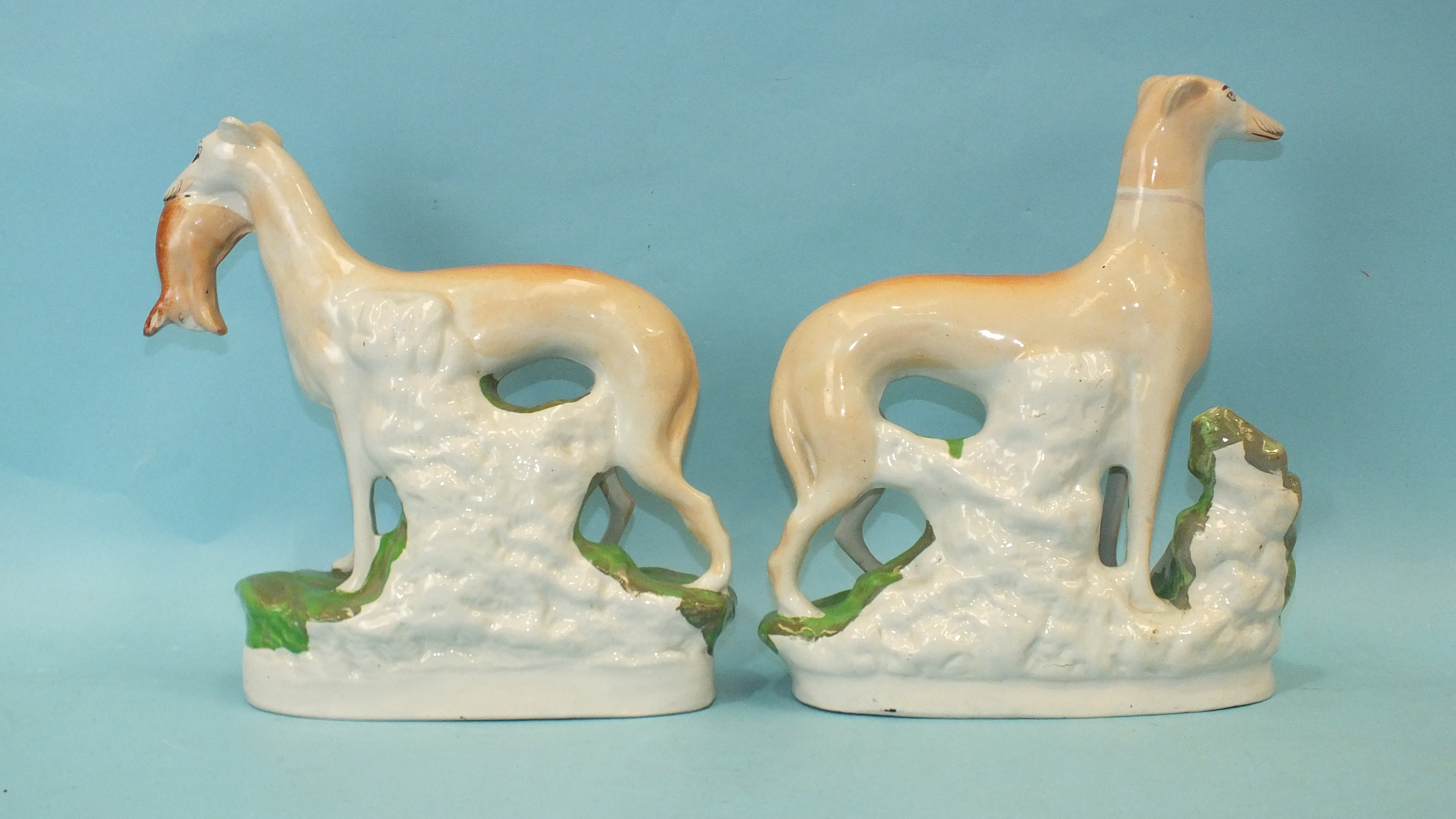 A pair of 19th century Staffordshire pottery figures of greyhounds, each standing, one with a hare - Image 2 of 3