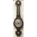 An early-19th century rosewood and mother-of-pearl-inlaid wheel barometer, with silvered dials,