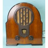 A 1930's Phillips valve radio "Super Inductance", in arch wooden case with Bakelite trim, 48.5cm