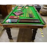 A mahogany half-size snooker/dining table by E J Riley Ltd, Accrington, the slate-bedded top below