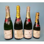 Moët et Chandon, Premier Cuvee, twelve bottles, in soiled cardboard case, three bottles uncased