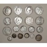A small collection of pre-1919 British silver coins, including a George IV 1826 half-crown, Victoria