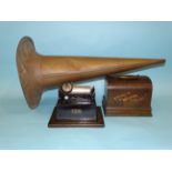 A Thomas A Edison 'GEM' phonograph in oak case, no. G110105, with lacquered brass horn, together