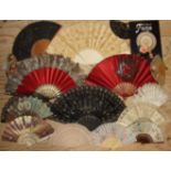 A large late-Victorian fan with plain bone guards and sticks and classically-painted leaf, (split