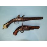 A Turkish flintlock duelling pistol and a converted miquelet belt pistol, the 13.5cm two-stage