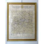 A framed AA London Route Map by John Bartholomew & Son Ltd, numbered A56/10.