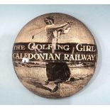 A Caledonian Railway advertising domed glass paperweight The Golfing Girl, Caledonian Railway, A