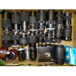 Twenty-three lenses, including Sigma (x4), Minolta (x3), Miranda (x2), Vivitar (x3) and others, with