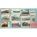 A collection of railway postcards and photographs: 134 postcards, including RP's, 172 photographs,