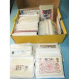 A collection of philatelic postcards, including many sets.