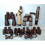 A collection of vintage and later binoculars, including military binoculars by Akershaw & Son (a/