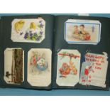An album of approximately 180 postcards: humour, Lawson Wood, Mabel Lucie Attwell, Vera Paterson,