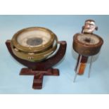 A ships brass gimbal compass, 15cm diameter, marked Patt.183 no.3792B, mounted on a wooden stand,