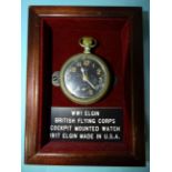 An Elgin USA open-face keyless pocket watch, the black face with luminous Arabic numerals and