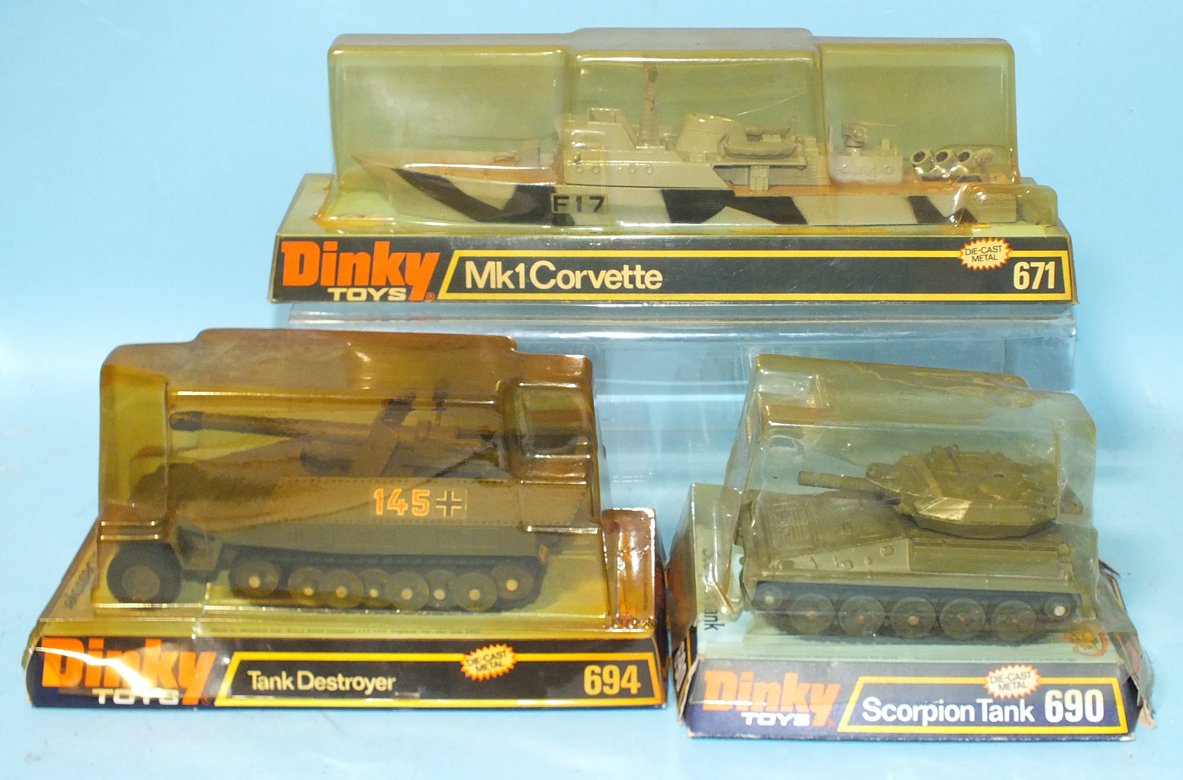 Dinky Toys, 671 Mk1 Corvette, 690 Scorpion Tank and 694 Tank Destroyer, all in bubble packaging.